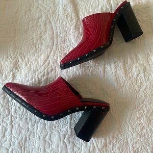 Red snakeskin print mules with studs, size 8. Never worn.